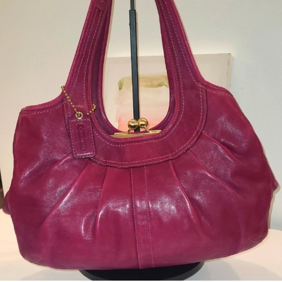 Coach Handbags - Coach magenta Leather RARE ERGO KISSLOCK  Bag